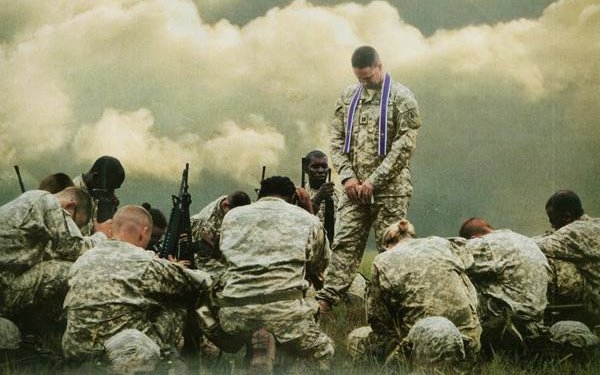 mfc-Chaplain-praying-in-the-field